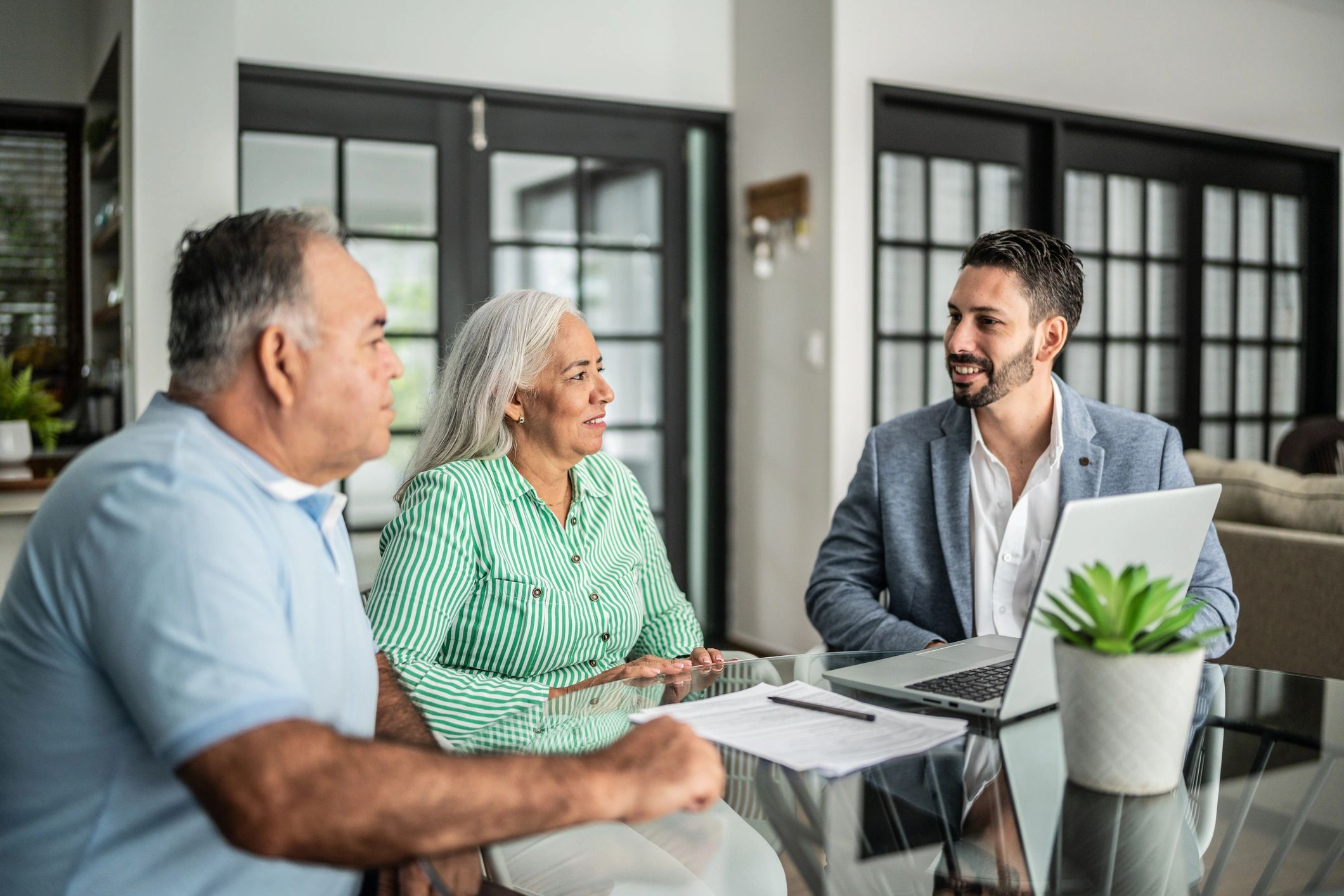 Insurance agent meeting with a senior couple