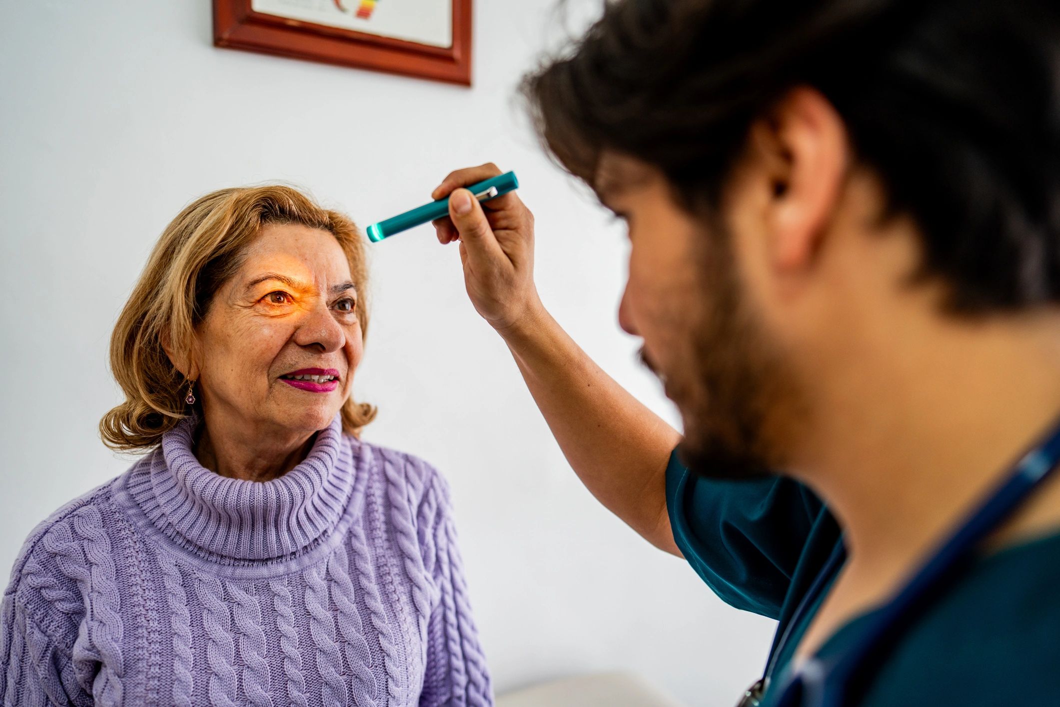 Doctor examining a senior patient during a checkup